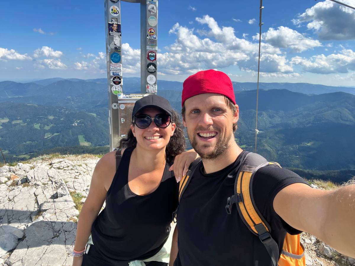 Happy hikers at the top of the beautiful Rax mountain in the Viennese Alps